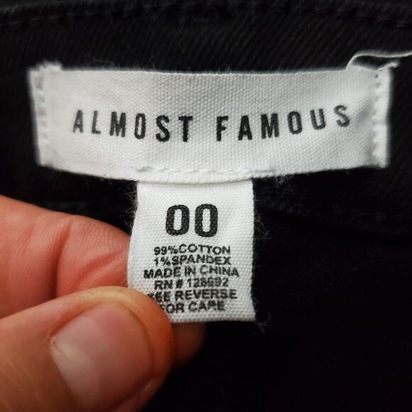 Almost Famous Women's Black High Rise Distressed Cut-off Jean Shorts Size 00 - Picture 4 of 5